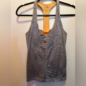 The NorthFace size S Racerback floral top with built in bra shelf